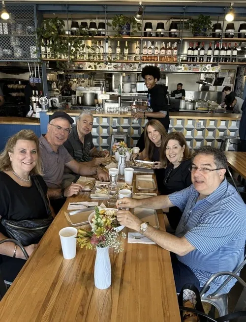 A food tour group exploring East Nashville's restaurant scene